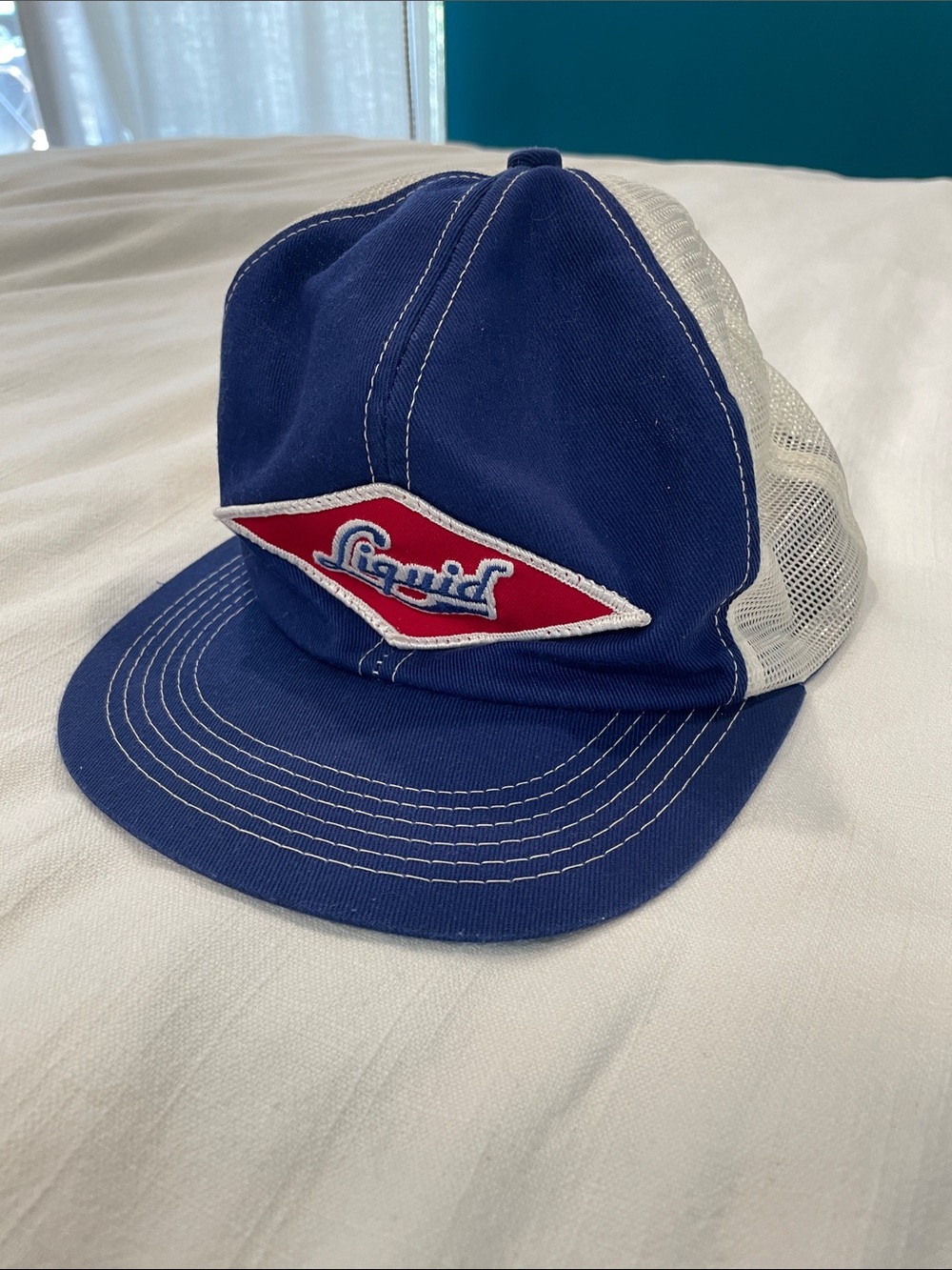 Vintage Liquid Blue and White Mesh Logo Trucker Hat